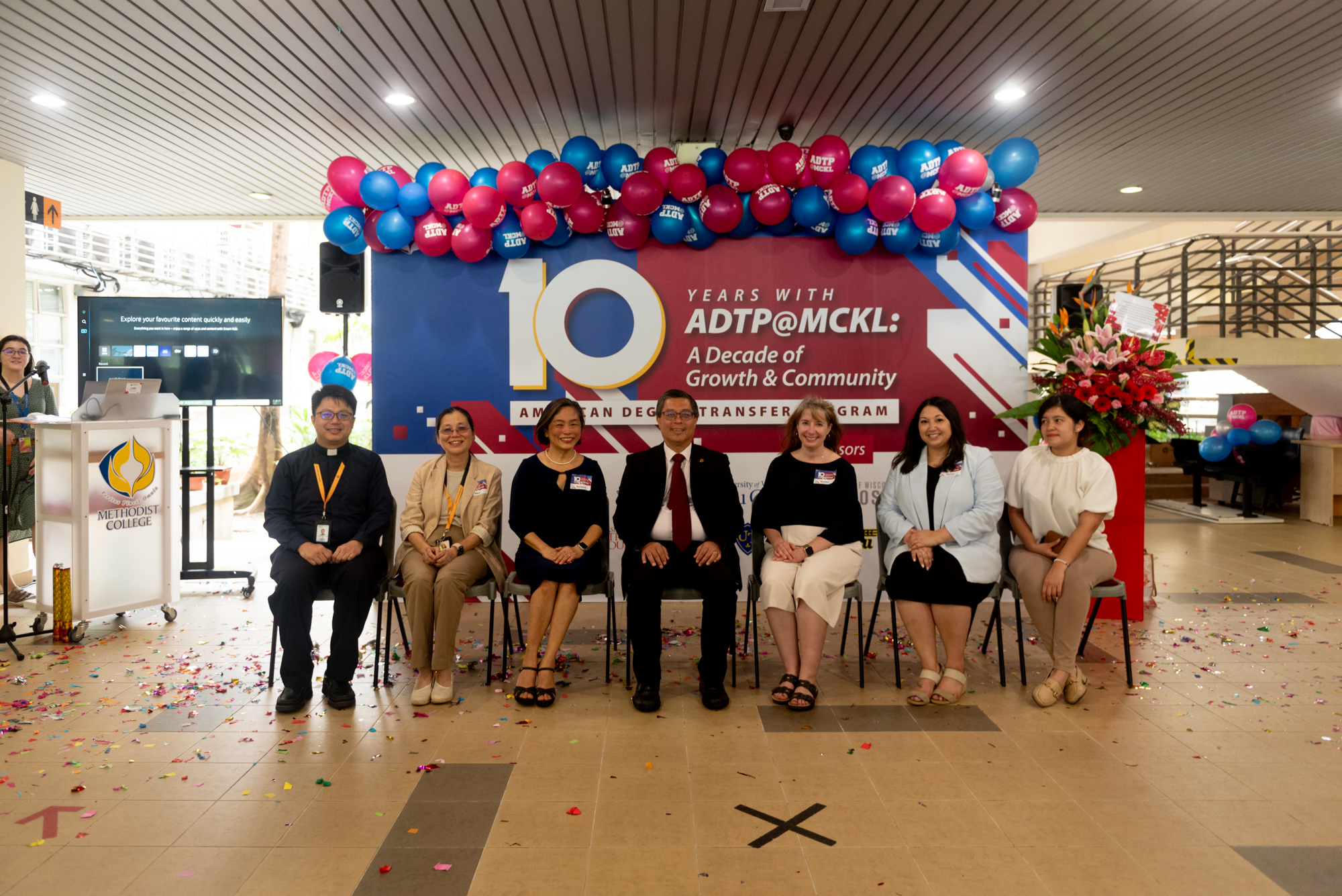 Dr Chua, Ms Khor Kheng Leik, and Rev. William Kwong alongside the representatives